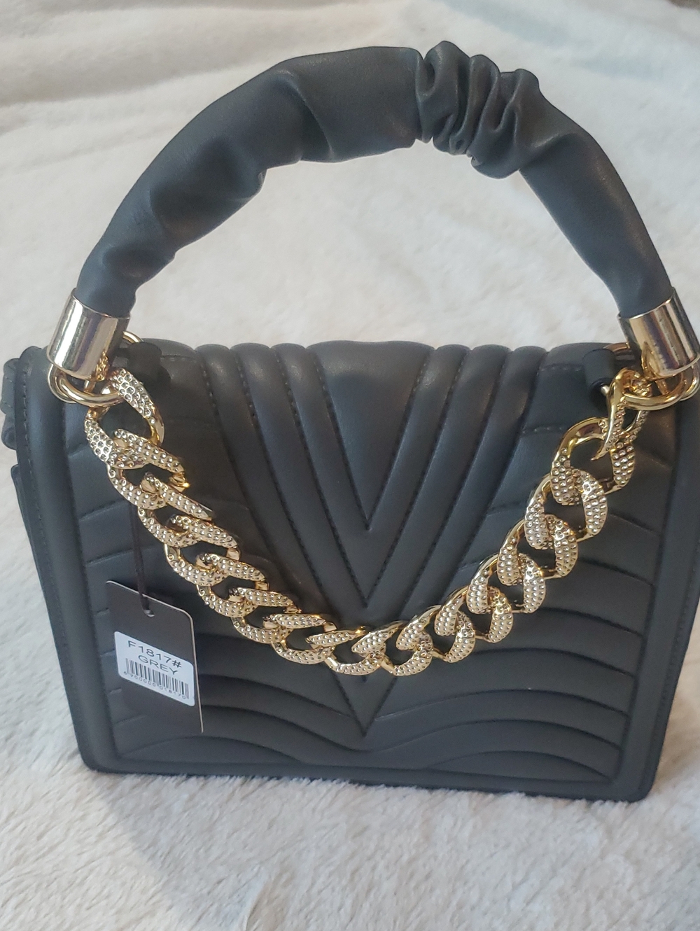 Quilted Black Shoulder Bag with Gold Chain Accent